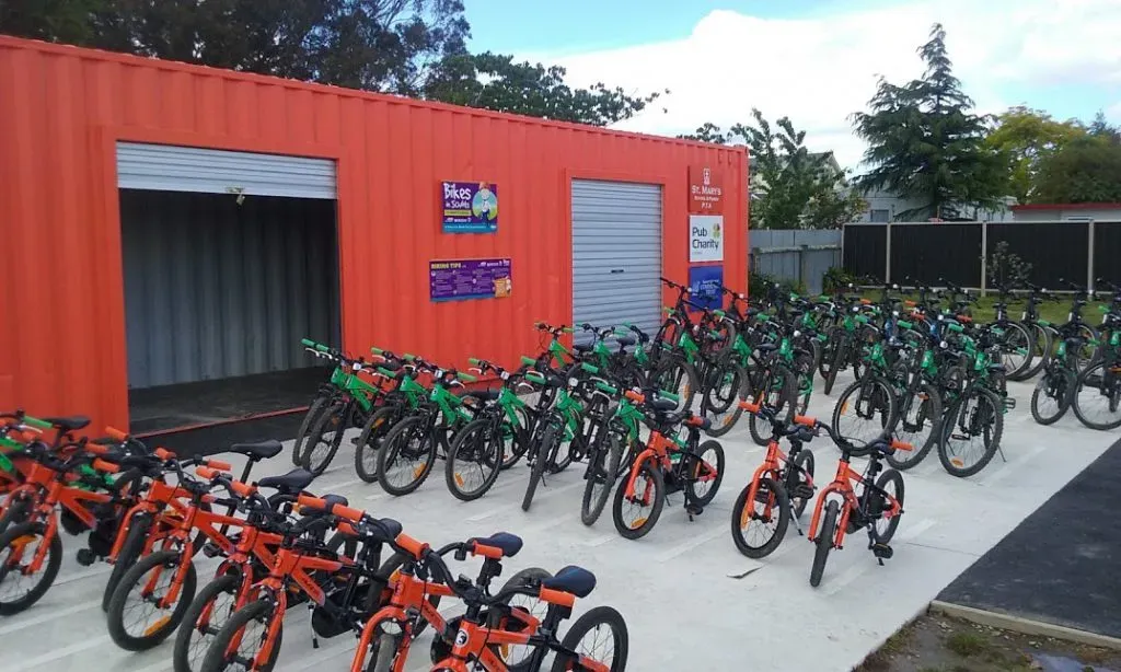 A concrete pad out front for daytime bike parking